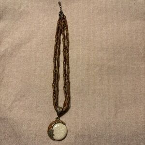 Elegant Gold and Silver Pendant Necklace